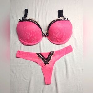 VS bra and panty set. Pink lace with white/black accents. 36 D panty, size Med.